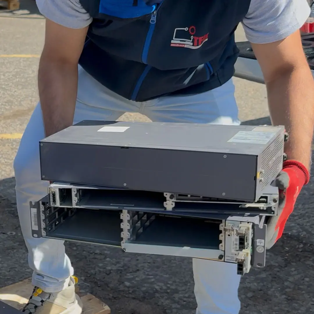 Sealed containers loaded into GPS-tracked WEEE collection van